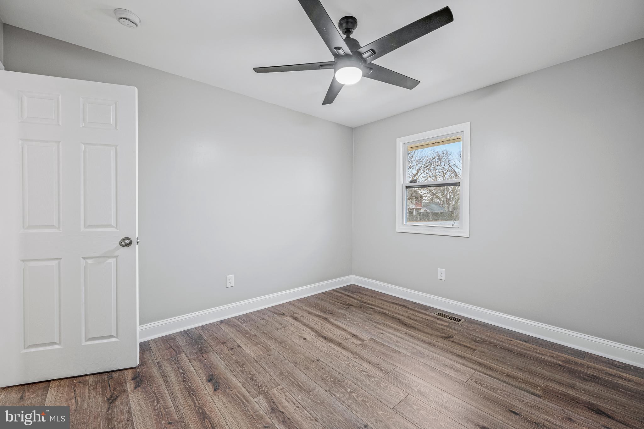 17731 Mason Dixon Road Hagerstown, MD 21740 - Photo 20 of 51 a view of empty room with wooden floor