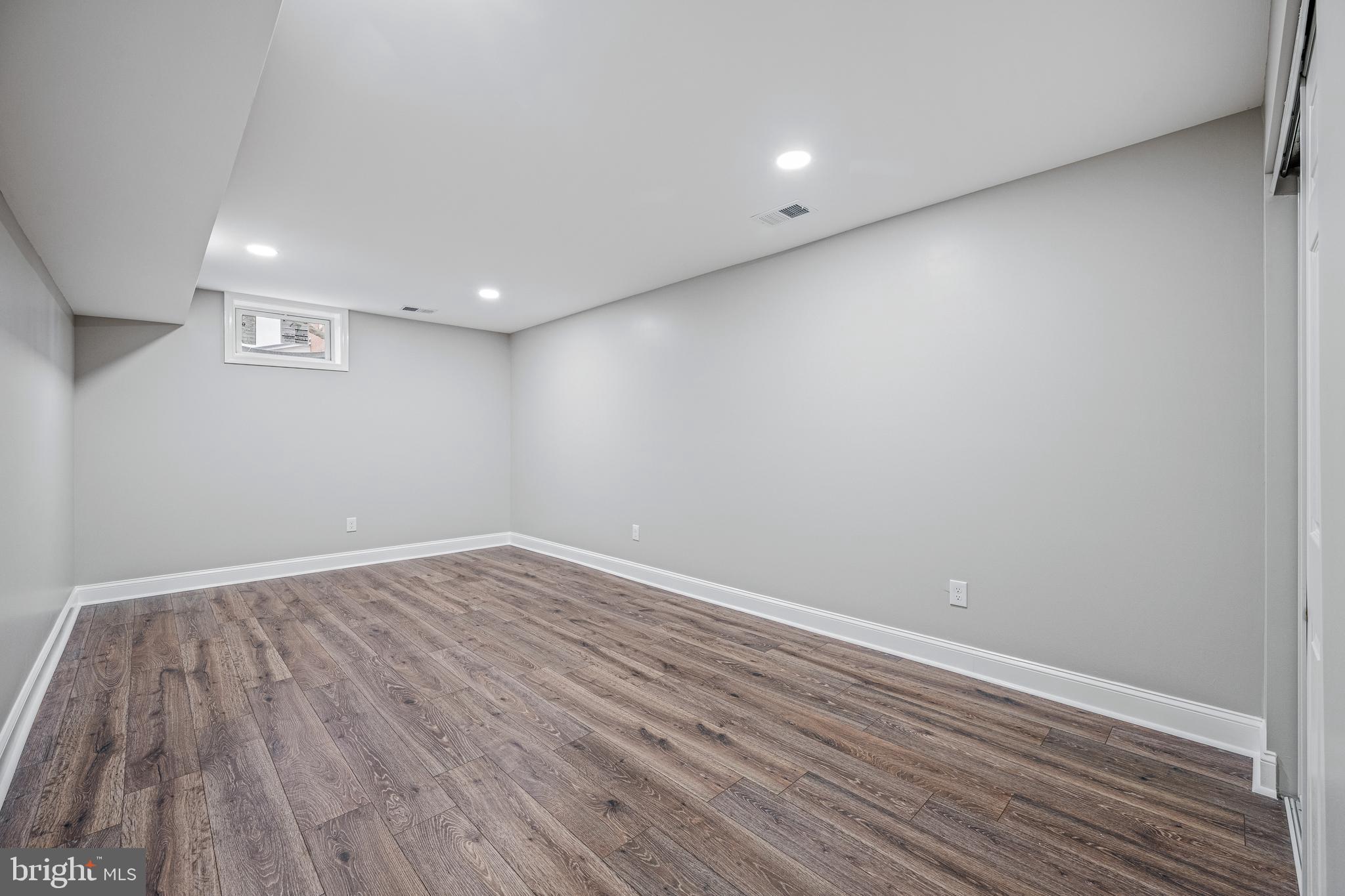 17731 Mason Dixon Road Hagerstown, MD 21740 - Photo 28 of 51 a view of room with wooden floor and fan