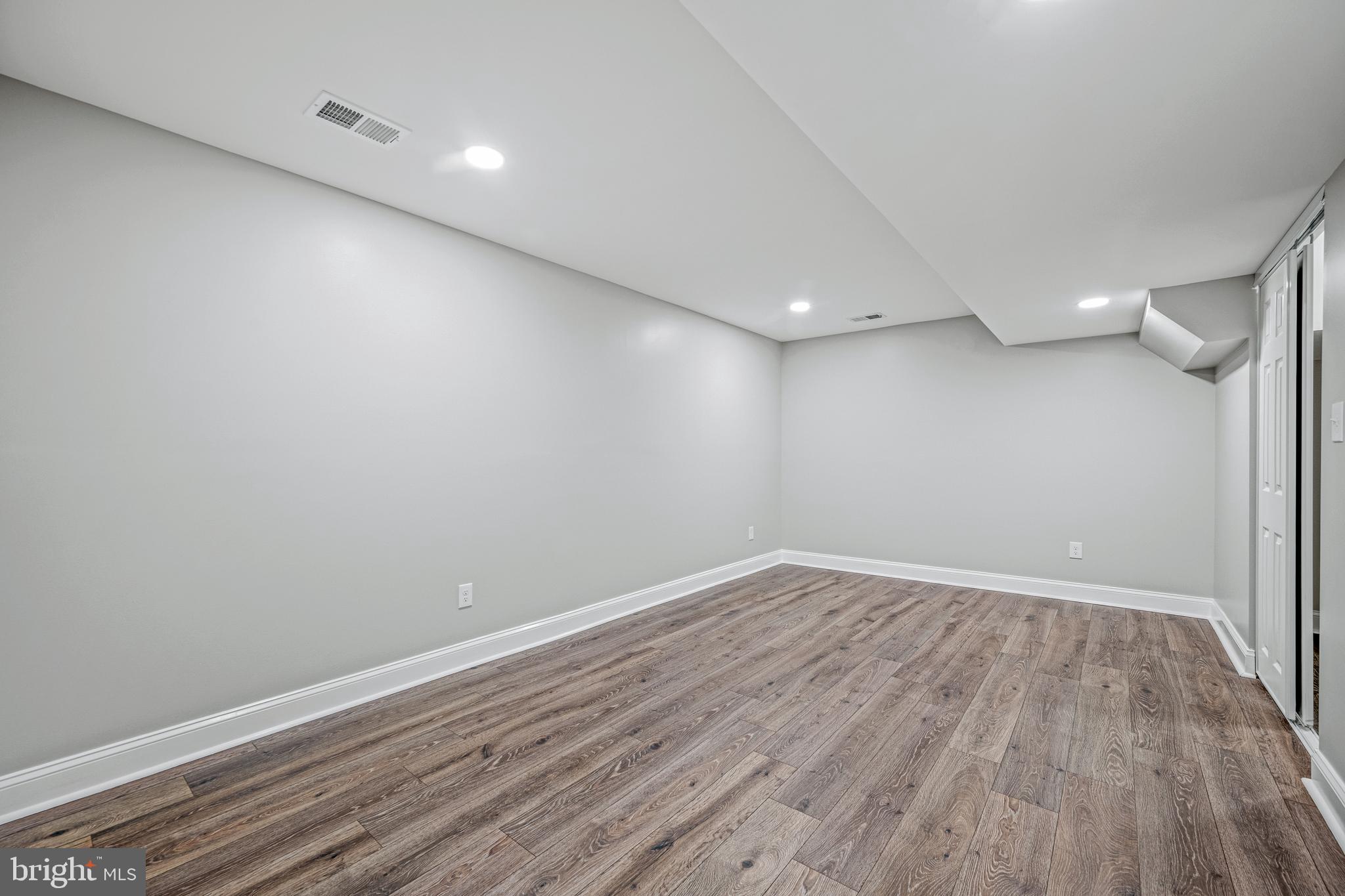 17731 Mason Dixon Road Hagerstown, MD 21740 - Photo 30 of 51 a view of room with wooden floor and fan