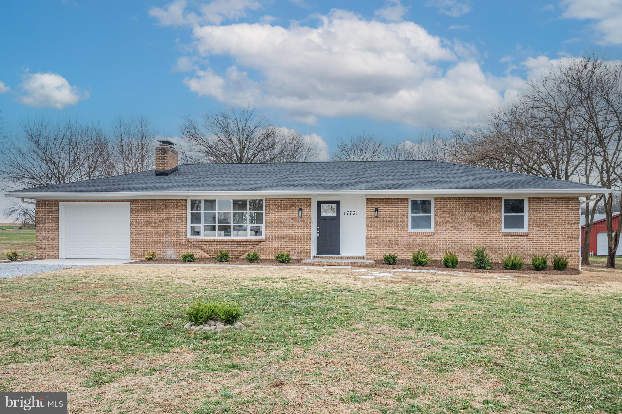 17731 Mason Dixon Road Hagerstown, MD 21740 - Photo 34 of 51 a view of a house with a yard