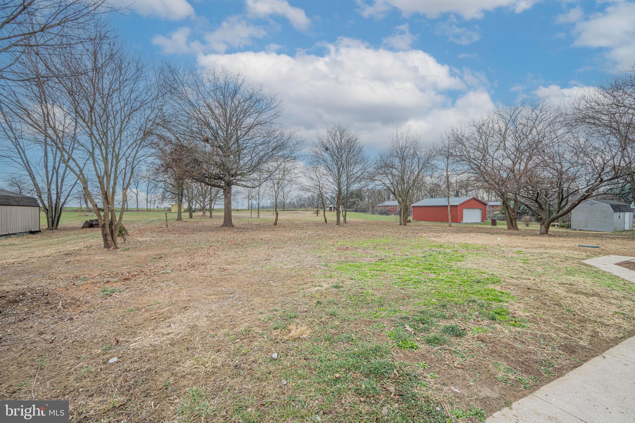 17731 Mason Dixon Road Hagerstown, MD 21740 - Photo 35 of 51 a view of yard with trees in the background