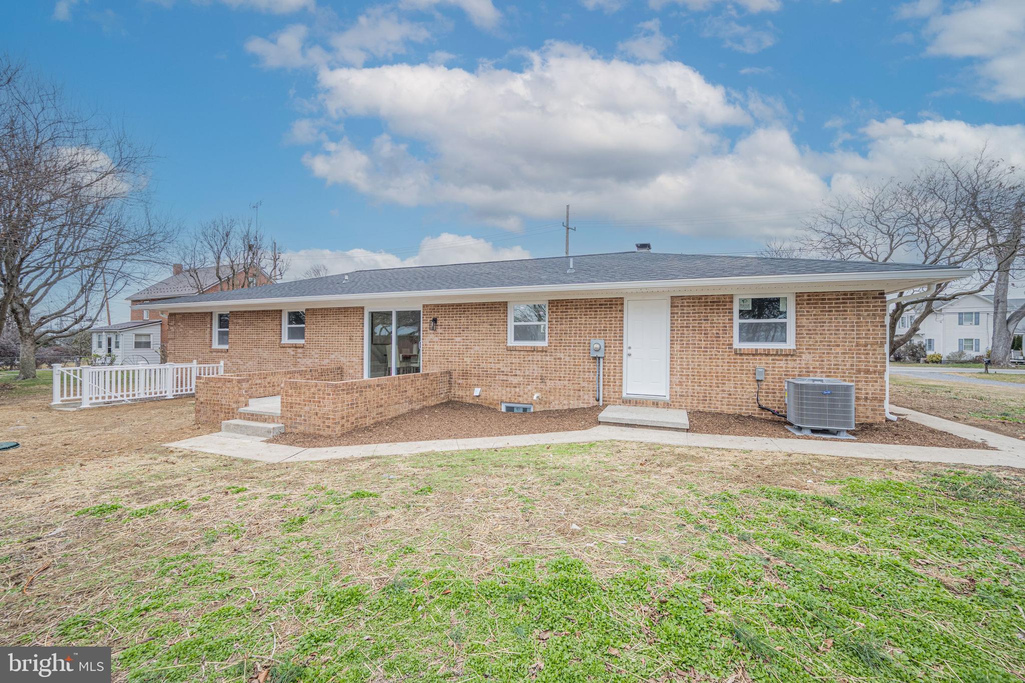 17731 Mason Dixon Road Hagerstown, MD 21740 - Photo 36 of 51 a backyard of a house with yard fire pit and outdoor seating