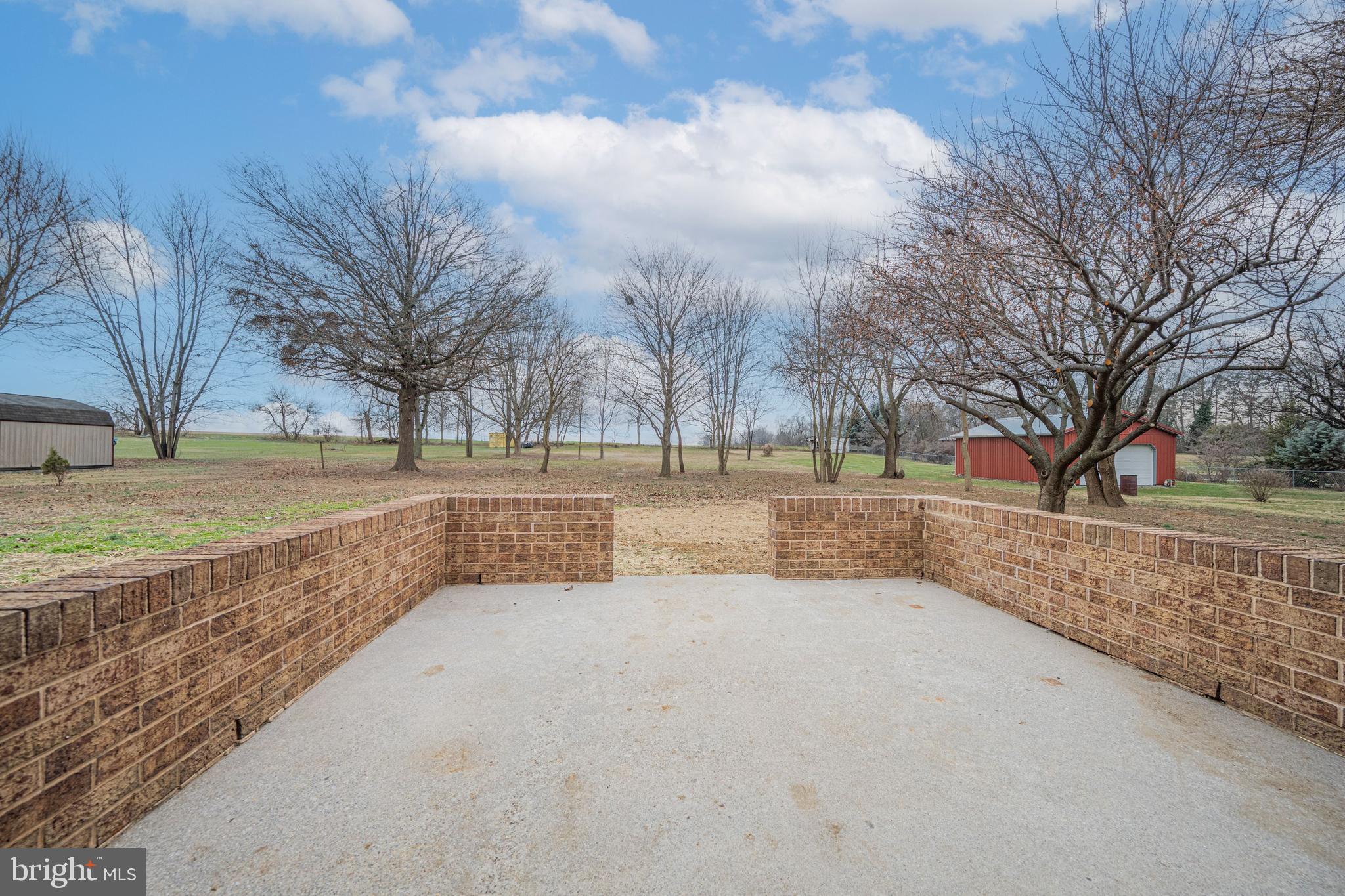 17731 Mason Dixon Road Hagerstown, MD 21740 - Photo 40 of 51 a view of outdoor space with deck and yard