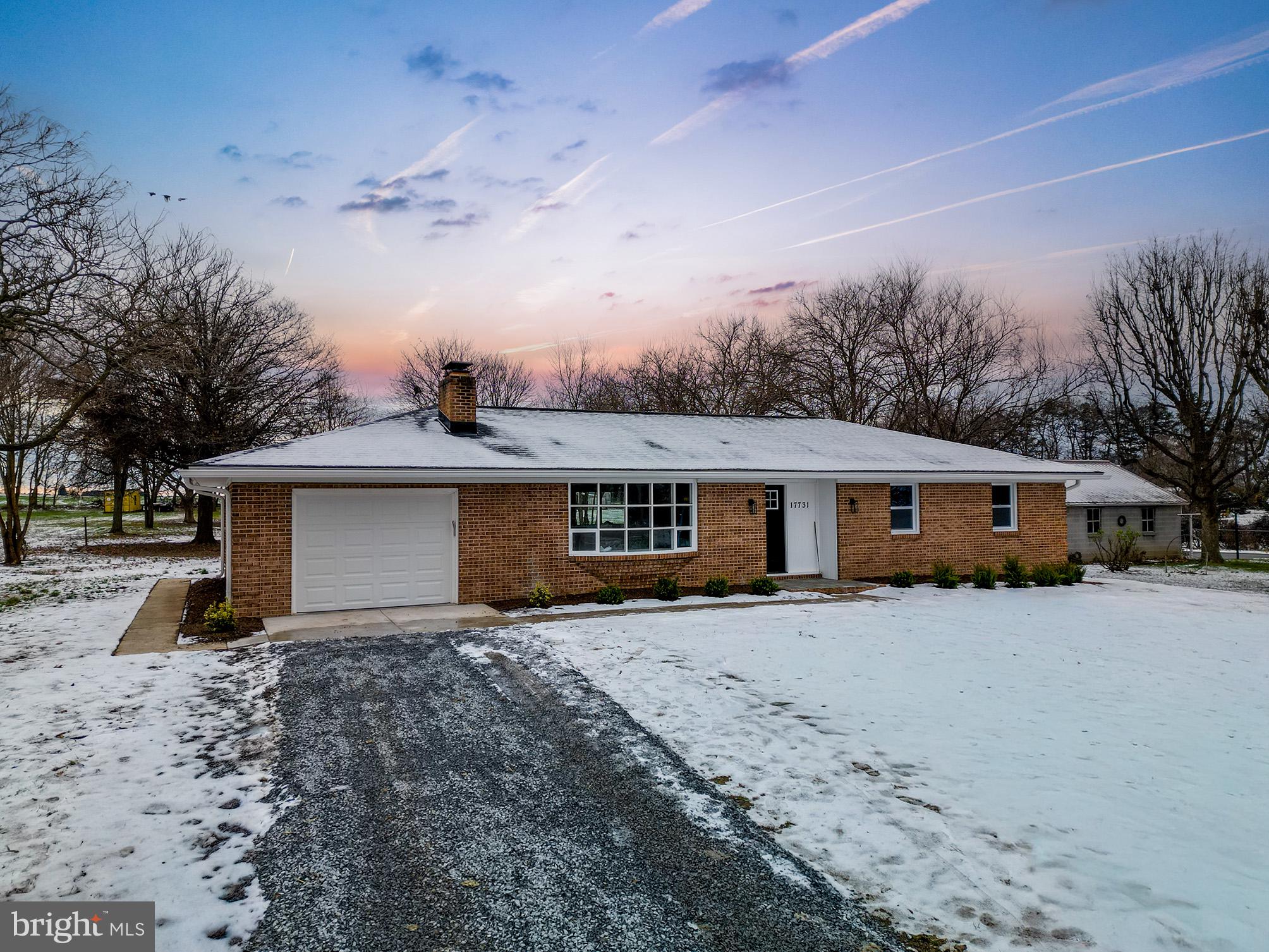 17731 Mason Dixon Road Hagerstown, MD 21740 - Photo 47 of 51 a front view of a house with a yard