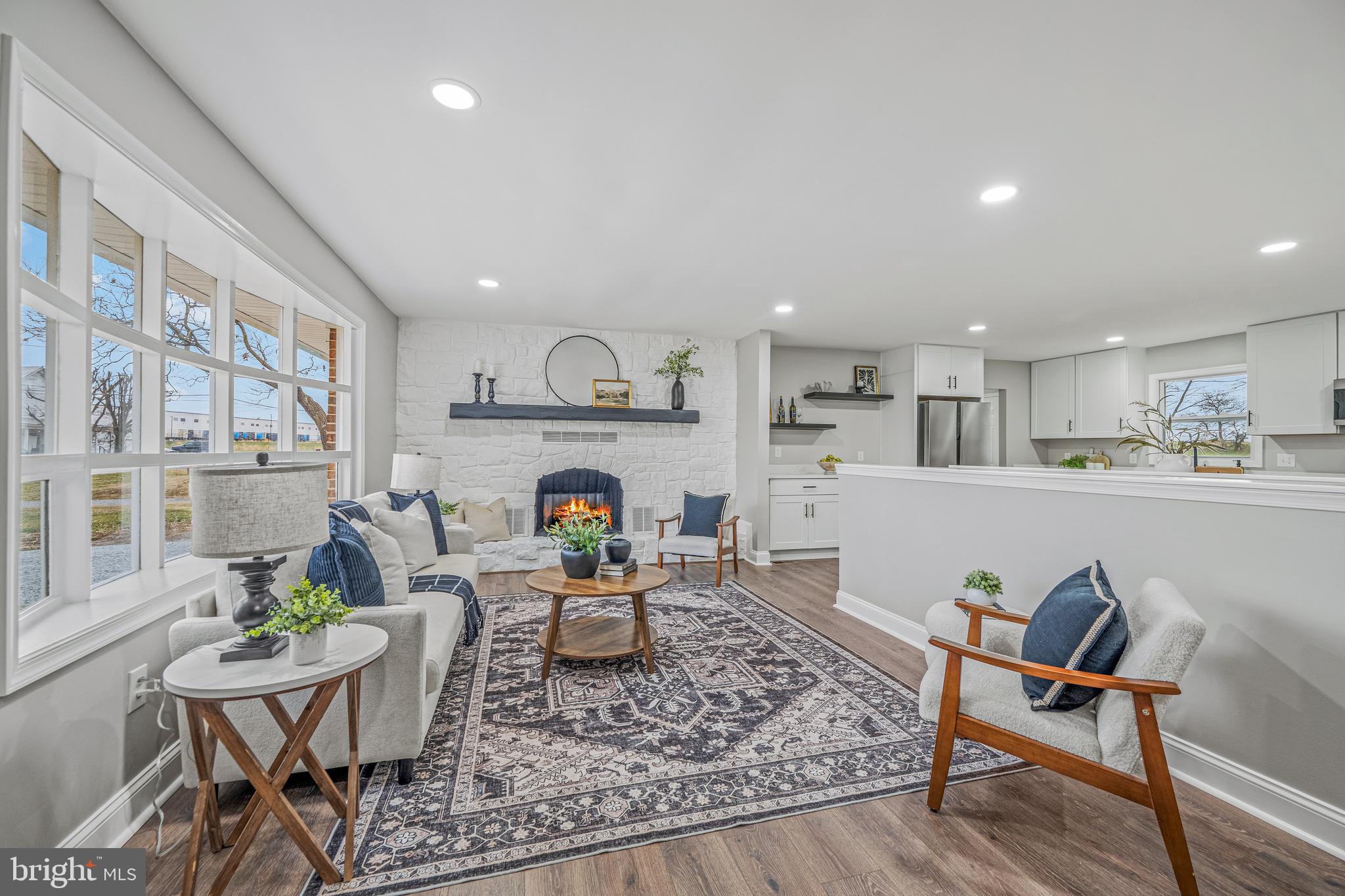 17731 Mason Dixon Road Hagerstown, MD 21740 - Photo 5 of 51 a living room with furniture and a fireplace