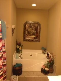 2337 Glennridge Road Columbia, TN 38401 - Photo 12 of 20 Master bath has wonderful step-up tub, double vanities, tile floors, and large walk-in closet.