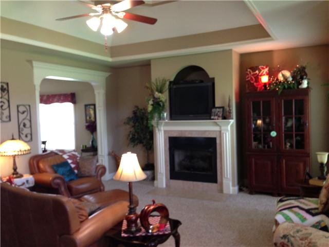2337 Glennridge Road Columbia, TN 38401 - Photo 3 of 20 Large great room features tray ceiling. lots of pretty windows, fireplace and the TV remains!