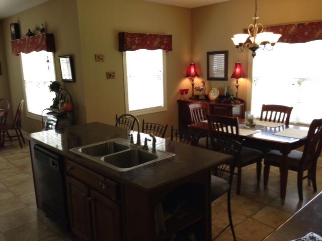 2337 Glennridge Road Columbia, TN 38401 - Photo 7 of 20 Wonderful island separates kitchen and dining area and features a bar seating area that fits four stools!