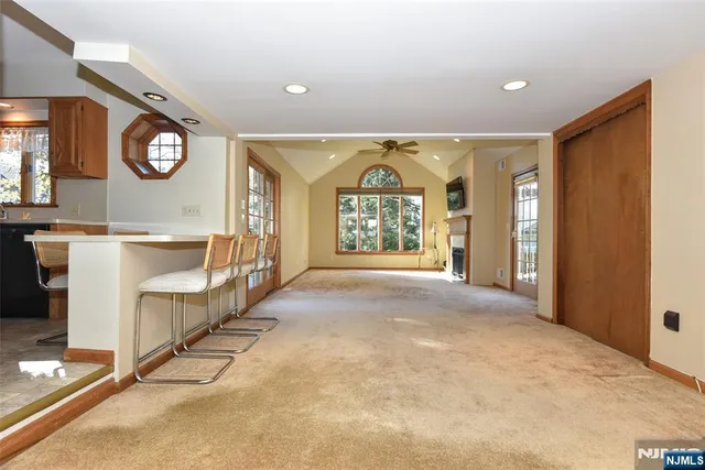 a view of a hallway with windows