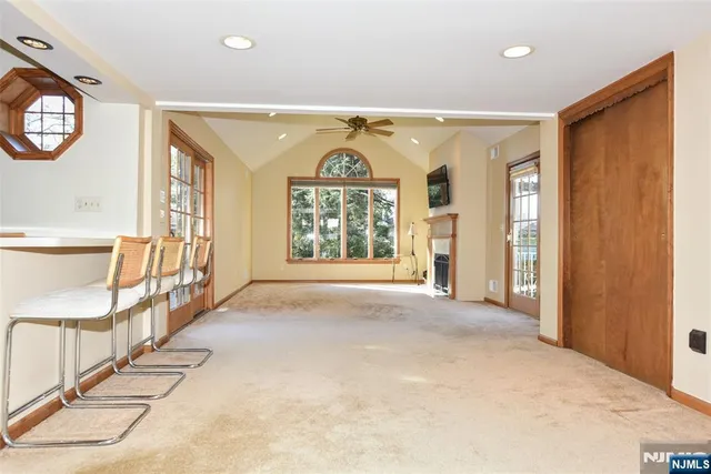 a view of a hallway with windows