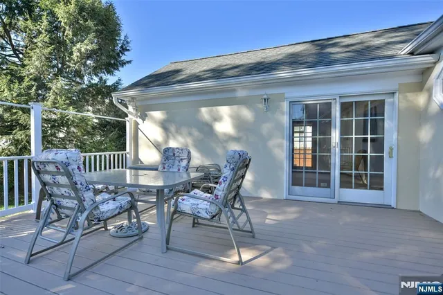 a view of a chairs and tables in the patio