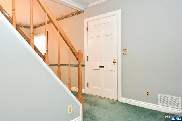 a view of hallway with stairs