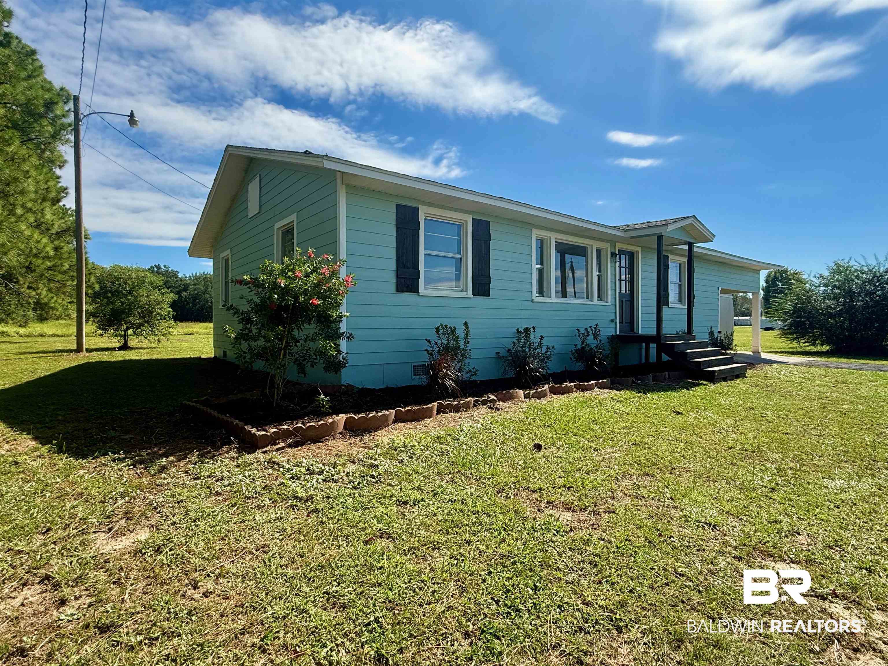 11698 Poser Road Foley, AL 36535 - Photo 3 of 20 Ranch-style home featuring crawl space and a front lawn