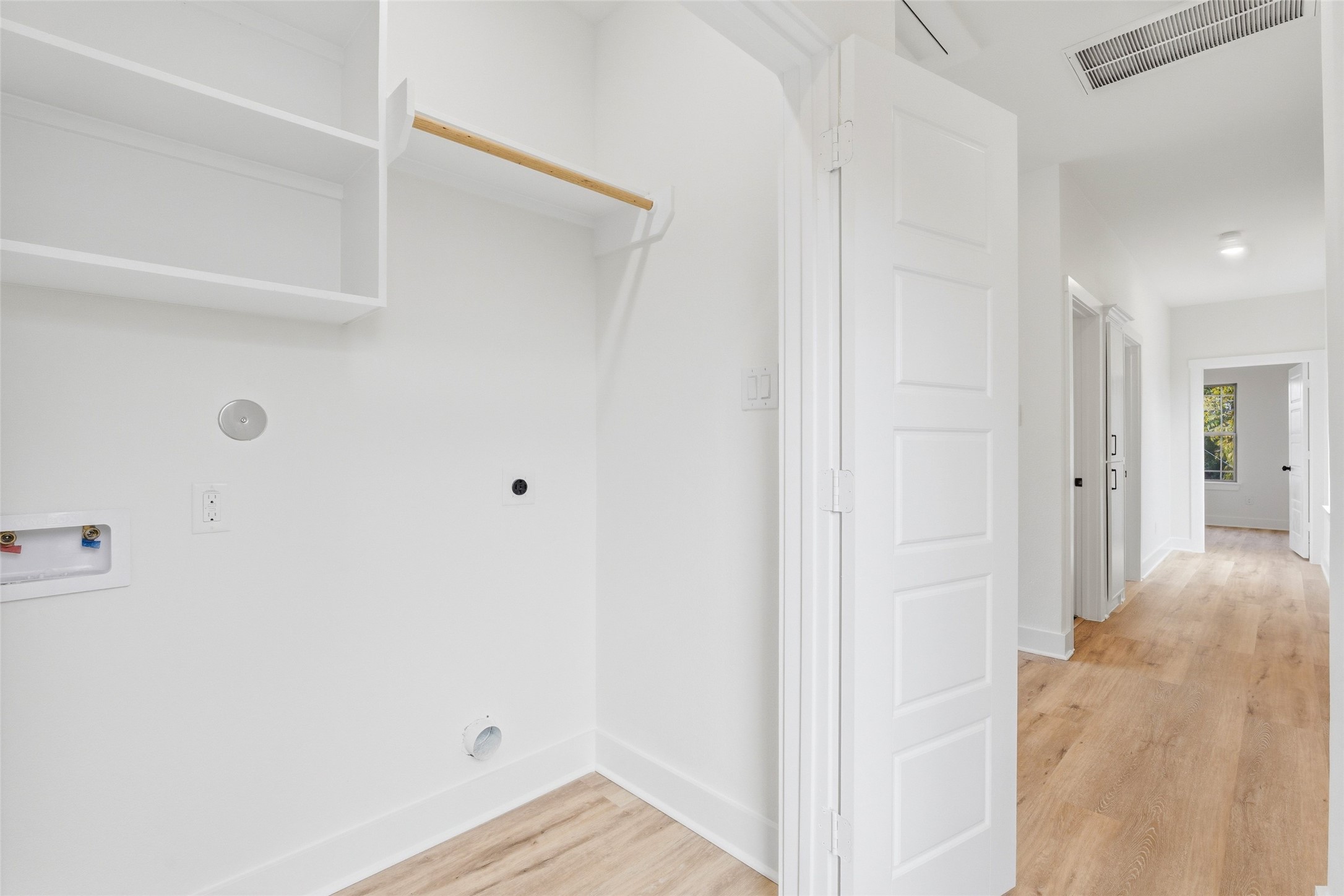 317 South 3rd Street La Porte, TX 77571 - Photo 11 of 15 a view of a hallway with wooden floor