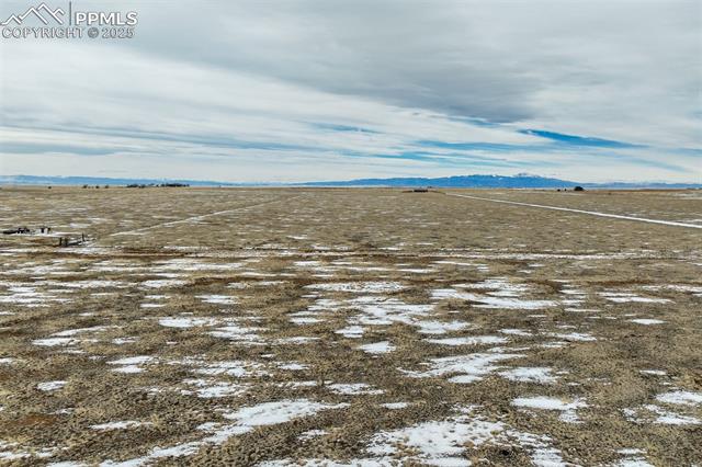 32290 North Neely Road Yoder, CO 80864 - Photo 24 of 26 View of water feature with a mountain view
