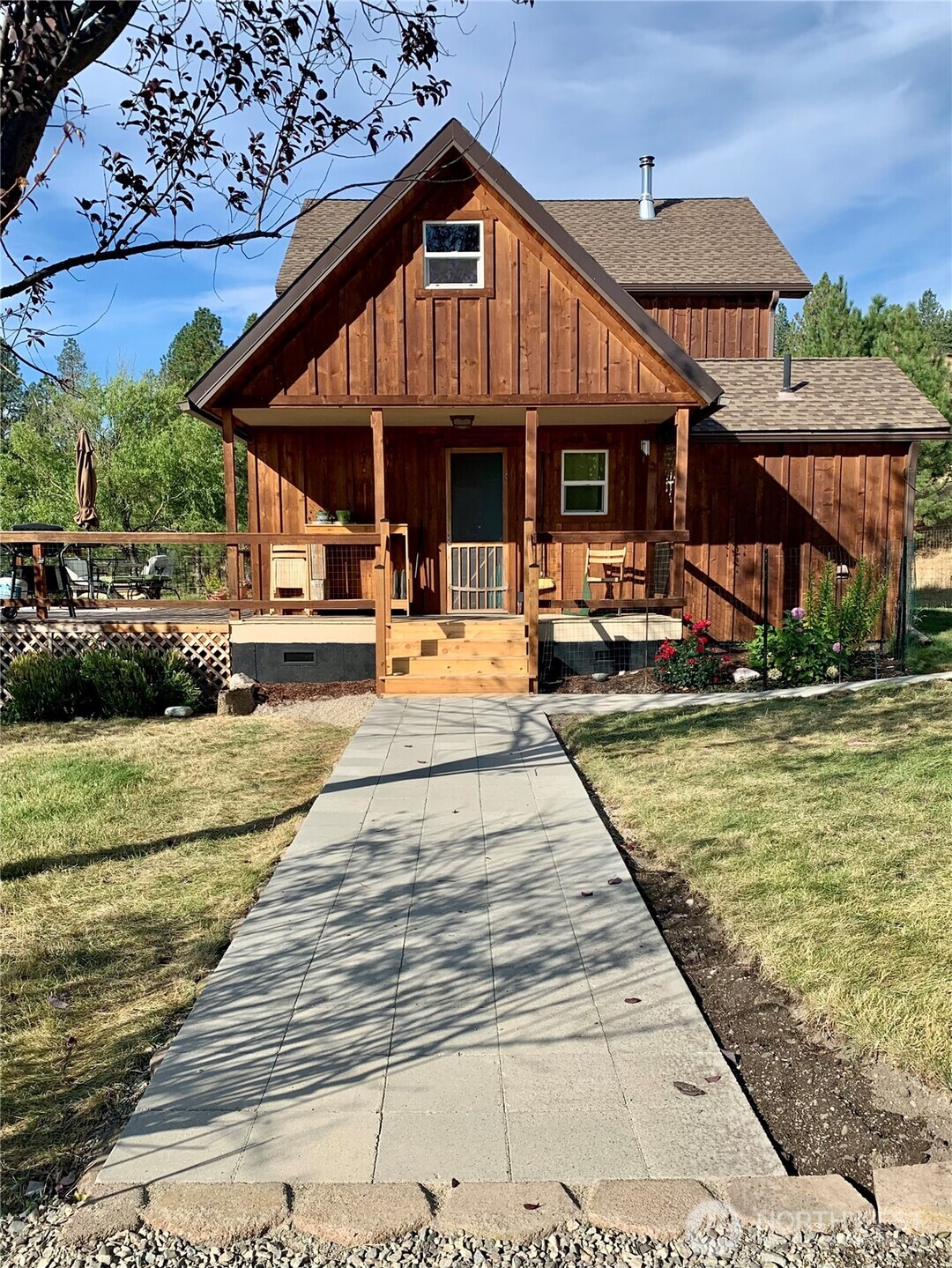 35 Low Ridge Road Malo, WA 99150 - Photo 1 of 40 a view of a swimming pool with a patio