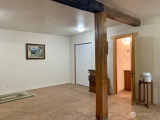 35 Low Ridge Road Malo, WA 99150 - Photo 20 of 40 a view of a hallway with a room