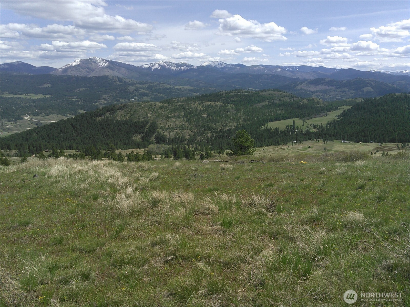 35 Low Ridge Road Malo, WA 99150 - Photo 37 of 40 a view of a town with mountains in the background