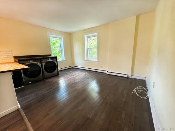 a view of an empty room and window