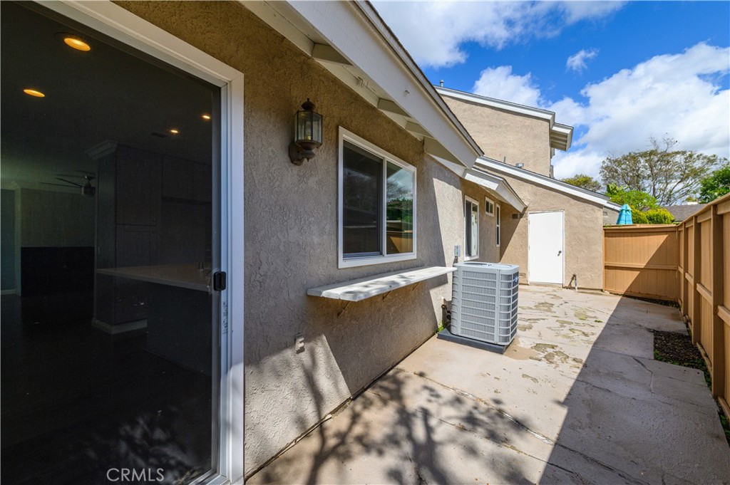 2 Hollowglen, Unit 7 Irvine, CA 92604 - Photo 30 of 31 a view of a house with a patio