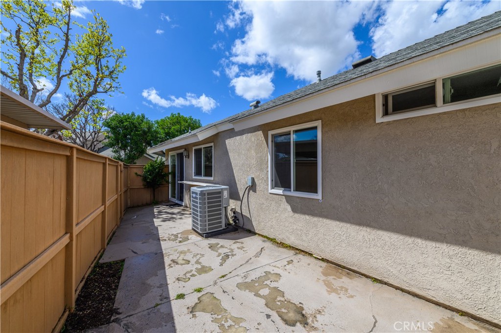 2 Hollowglen, Unit 7 Irvine, CA 92604 - Photo 31 of 31 a backyard of a house with seating space