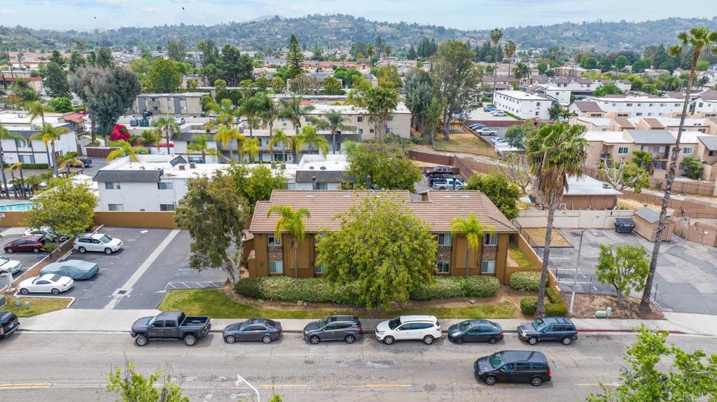 855 East Lexington Avenue, Unit 4 El Cajon, CA 92020 - Photo 11 of 12 an aerial view of residential houses with outdoor space