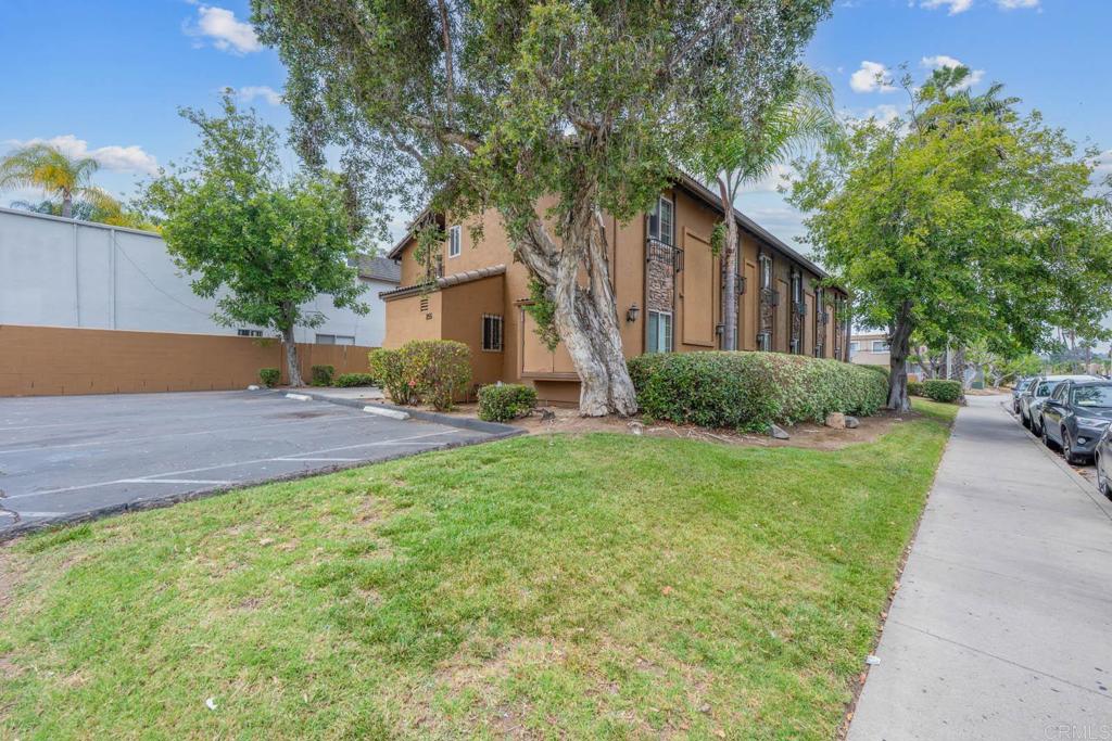 855 East Lexington Avenue, Unit 4 El Cajon, CA 92020 - Photo 12 of 12 a front view of a house with garden