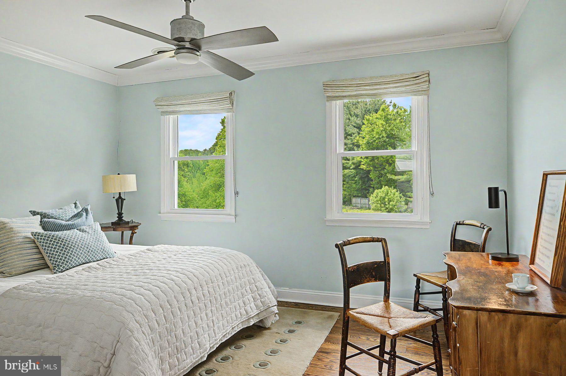 4009 Smoke Road Doylestown, PA 18902 - Photo 38 of 52 a bedroom with a bed a desk and chair with window