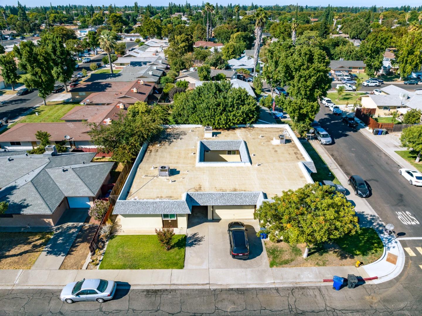 1317 East Rumble Road Modesto, CA 95355 - Photo 2 of 21 an aerial view of residential houses with outdoor space