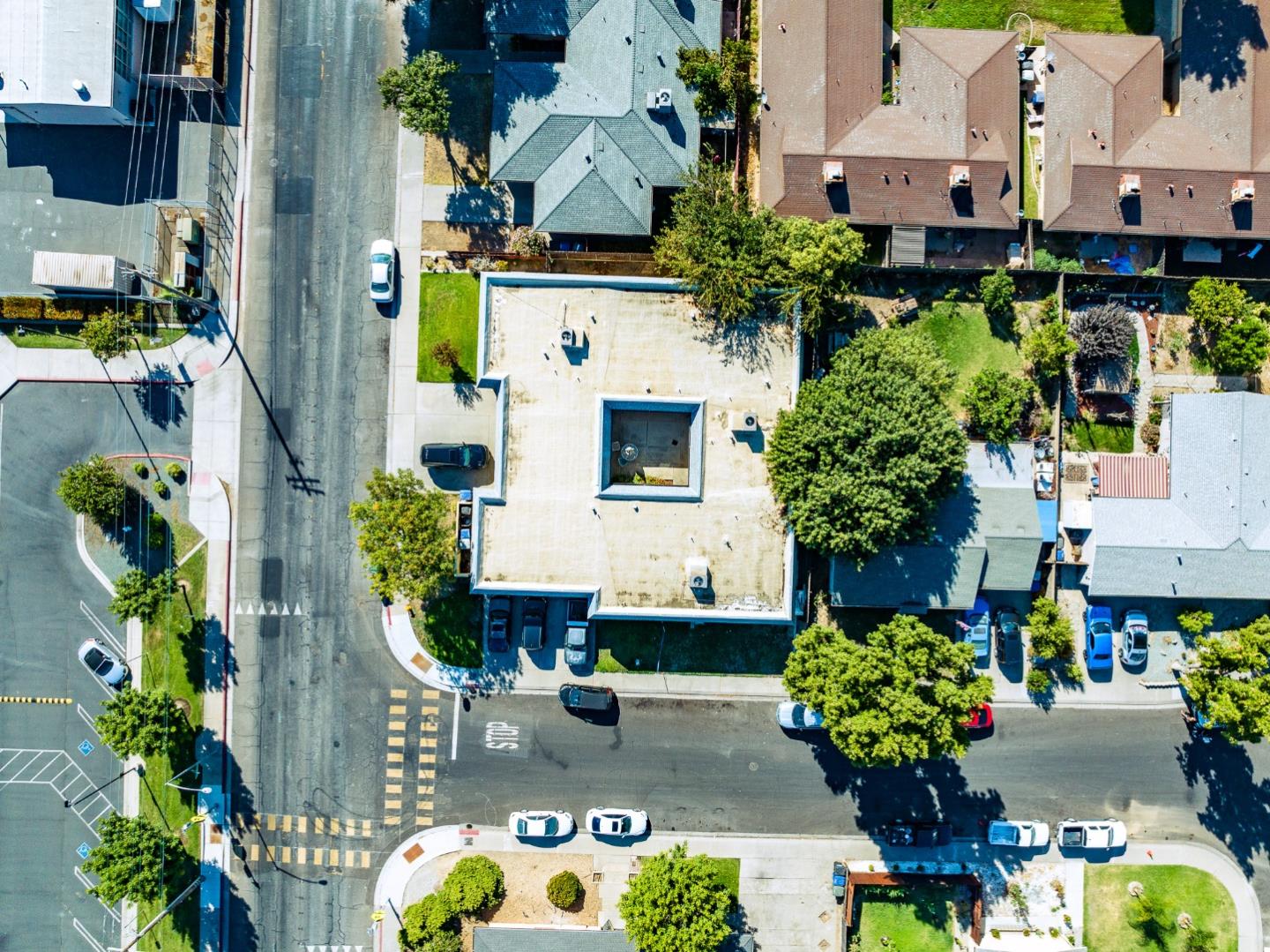 1317 East Rumble Road Modesto, CA 95355 - Photo 3 of 21 an aerial view of a house with a yard and garden