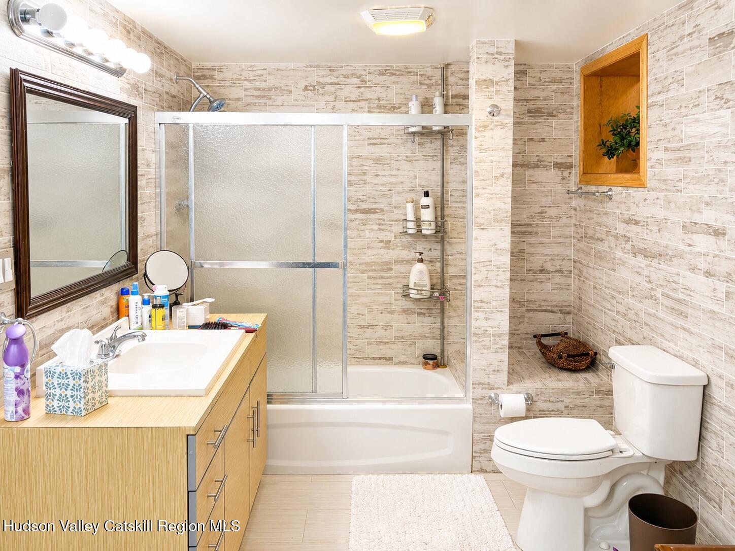 14 Park Road Chichester, NY 12416 - Photo 17 of 20 a bathroom with a sink toilet and shower