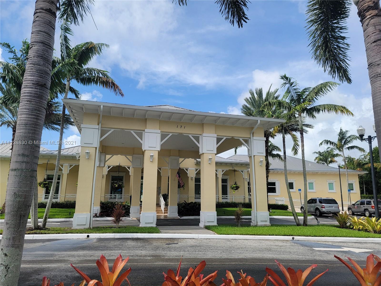 152 Southeast 29th Avenue, Unit 3 Homestead, FL 33033 - Photo 19 of 28 a front view of building with yard