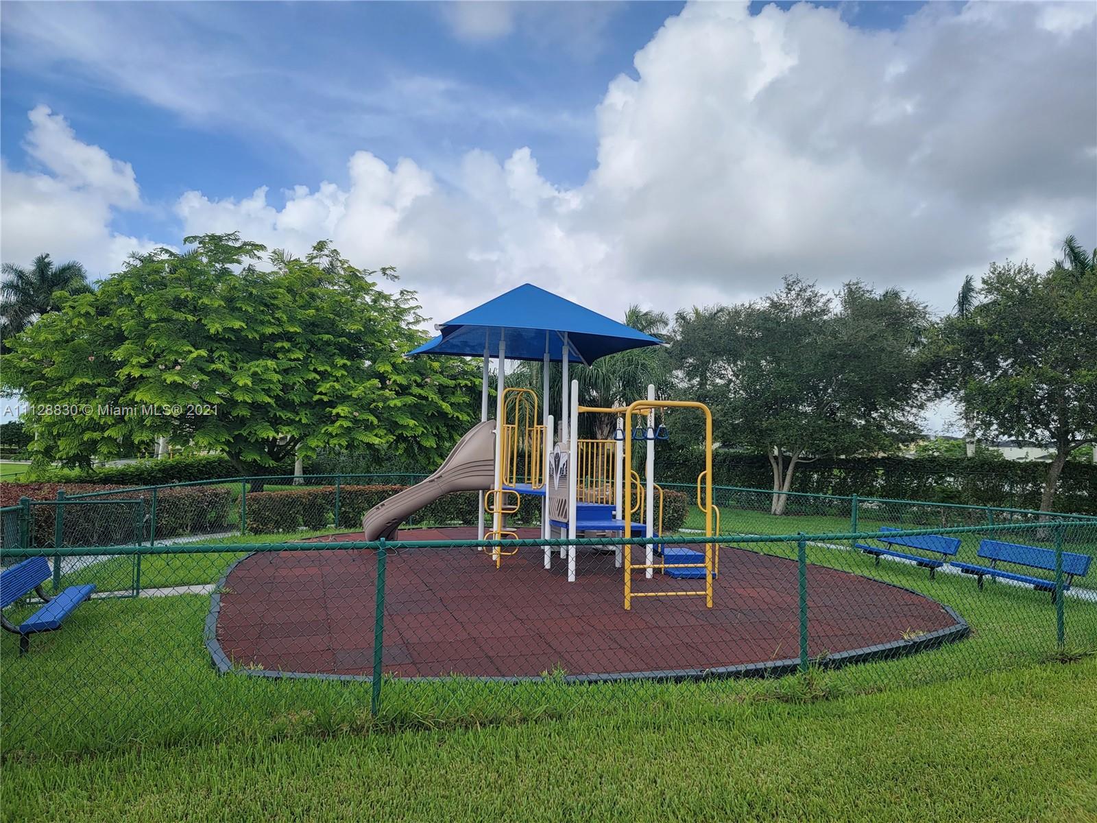 152 Southeast 29th Avenue, Unit 3 Homestead, FL 33033 - Photo 26 of 28 a view of a park with slide