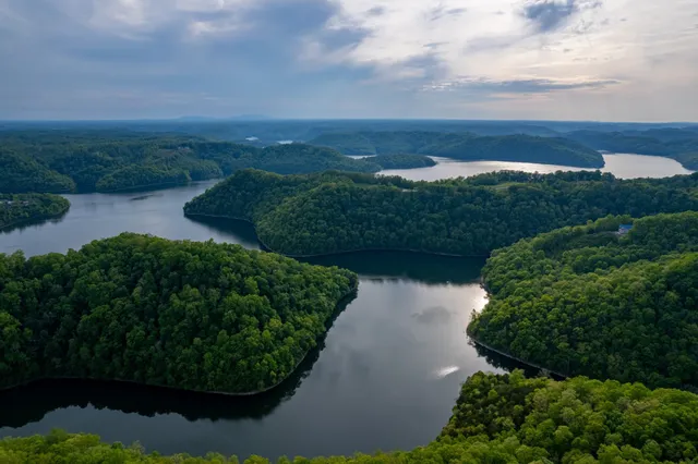 a view of a lake with a yard