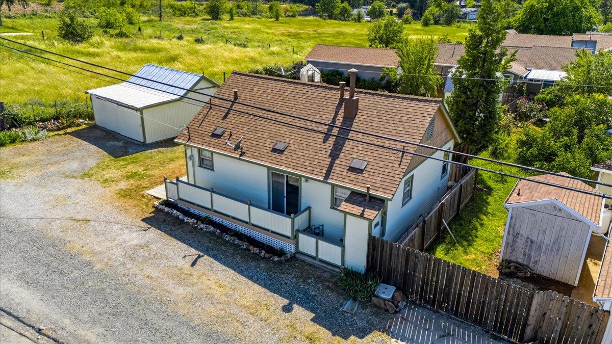 232 Upper Slate Creek Road Grass Valley, CA 95945 - Photo 44 of 48 a view of a house with wooden fence