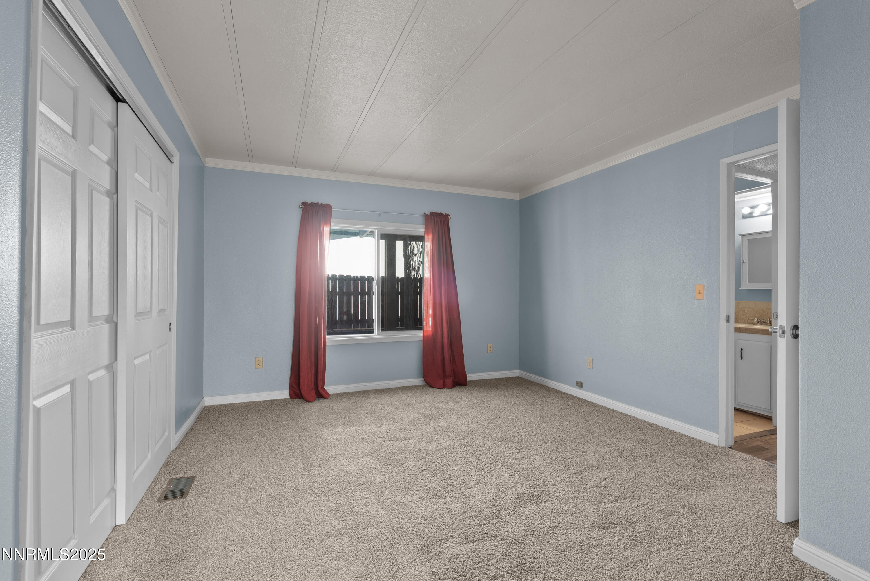 325 Parkland Way Fernley, NV 89408 - Photo 17 of 35 a view of an empty room and window