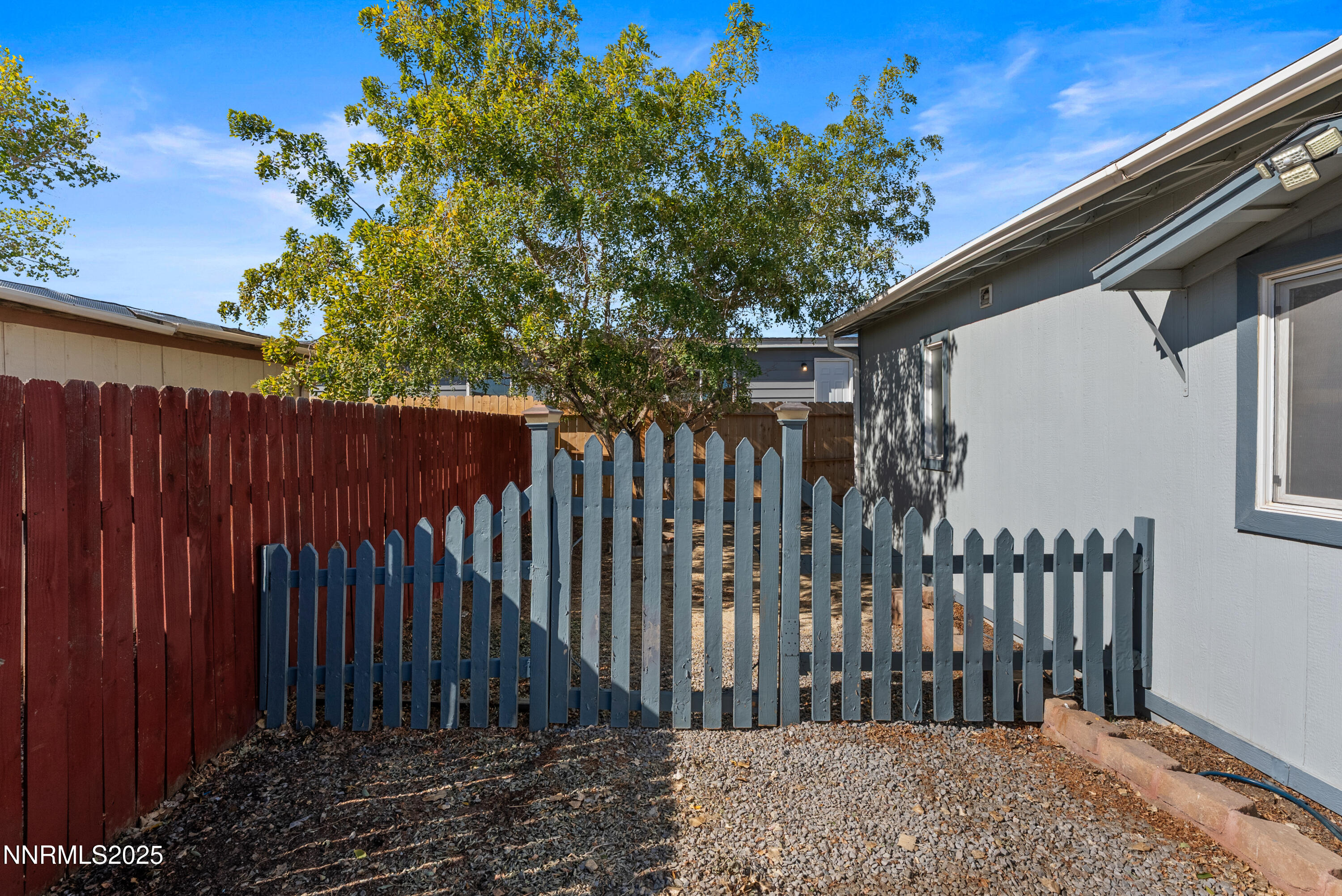 325 Parkland Way Fernley, NV 89408 - Photo 27 of 35 a view of a wooden fence