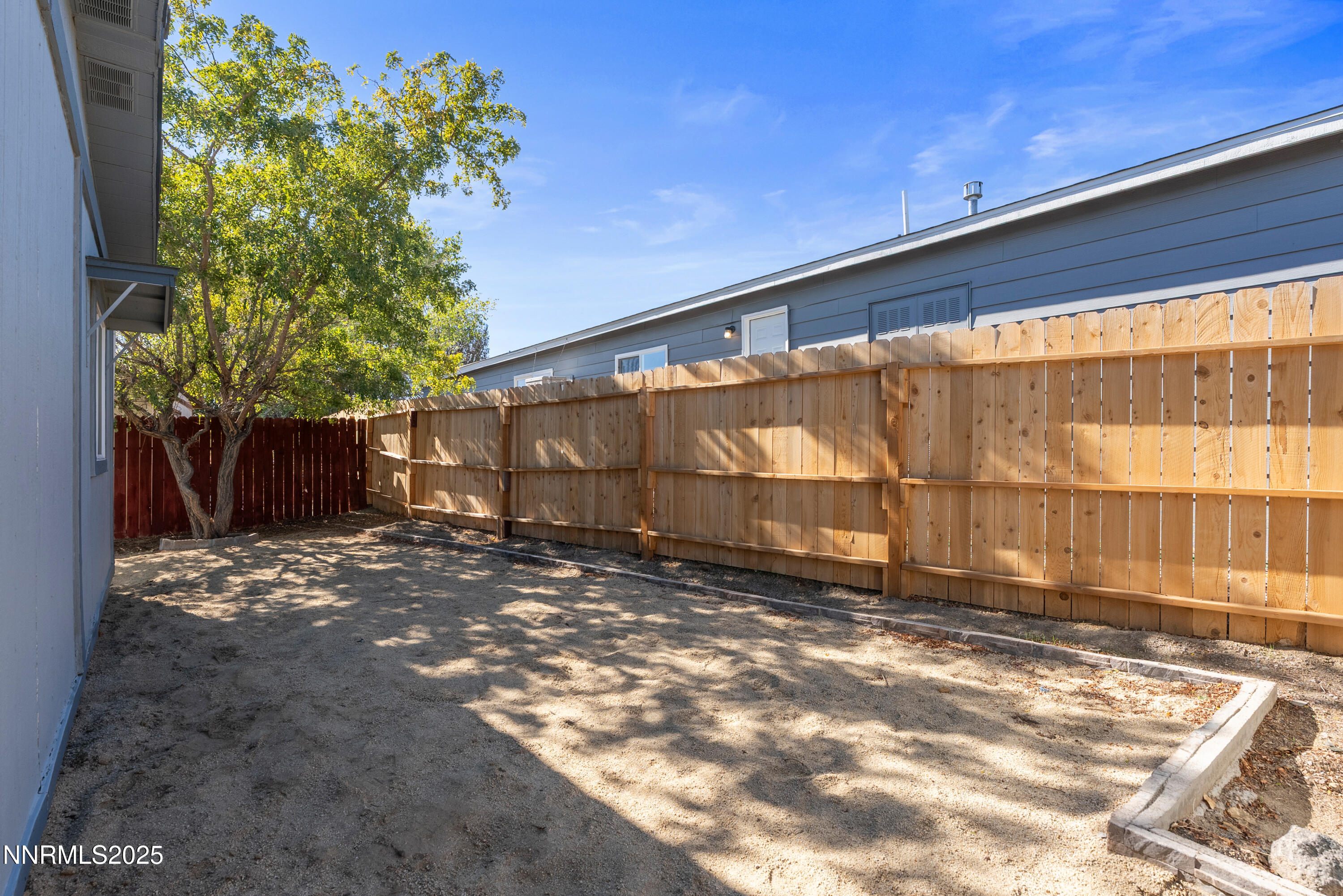 325 Parkland Way Fernley, NV 89408 - Photo 30 of 35 a view of a backyard