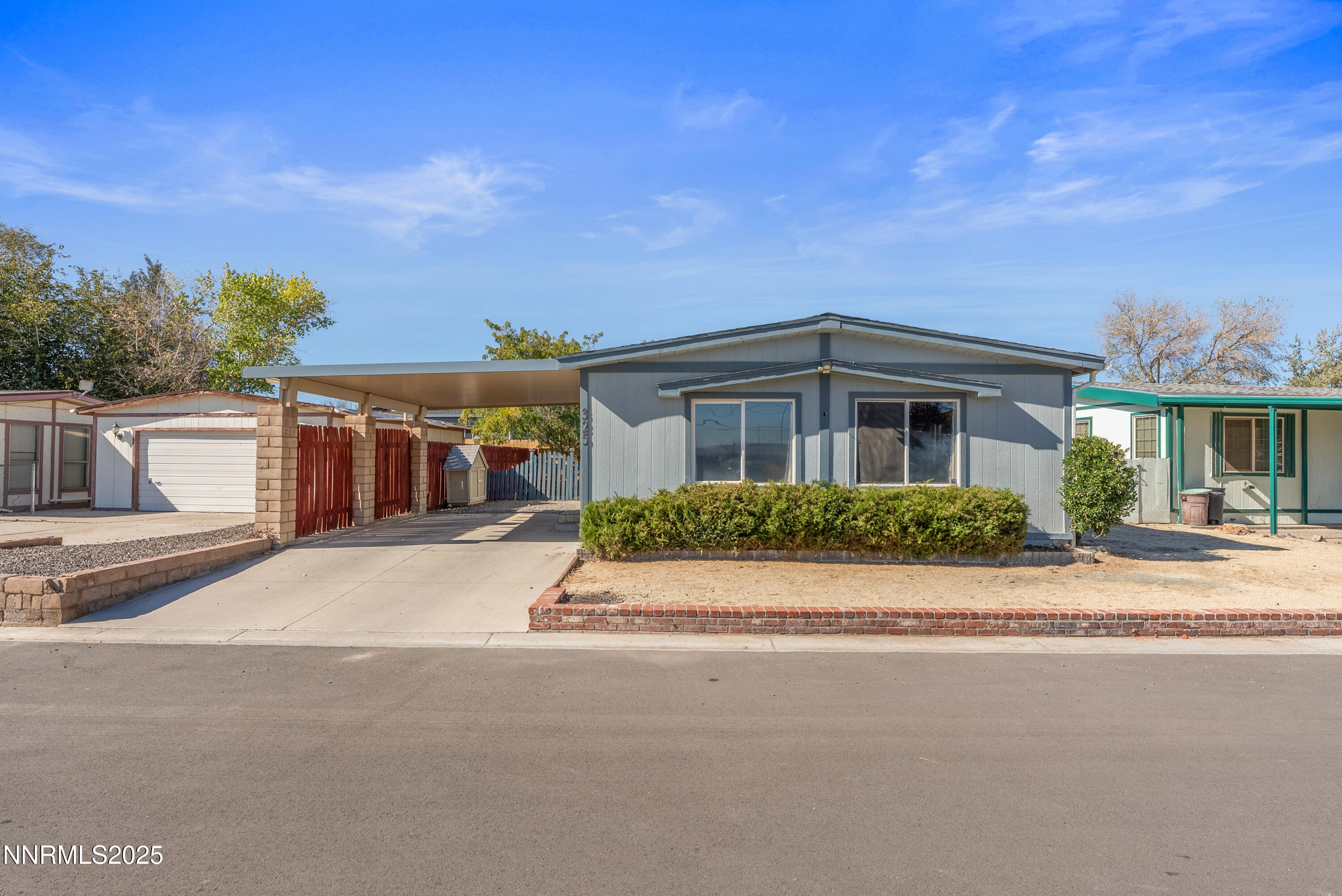 325 Parkland Way Fernley, NV 89408 - Photo 3 of 35 front view of a house with a street