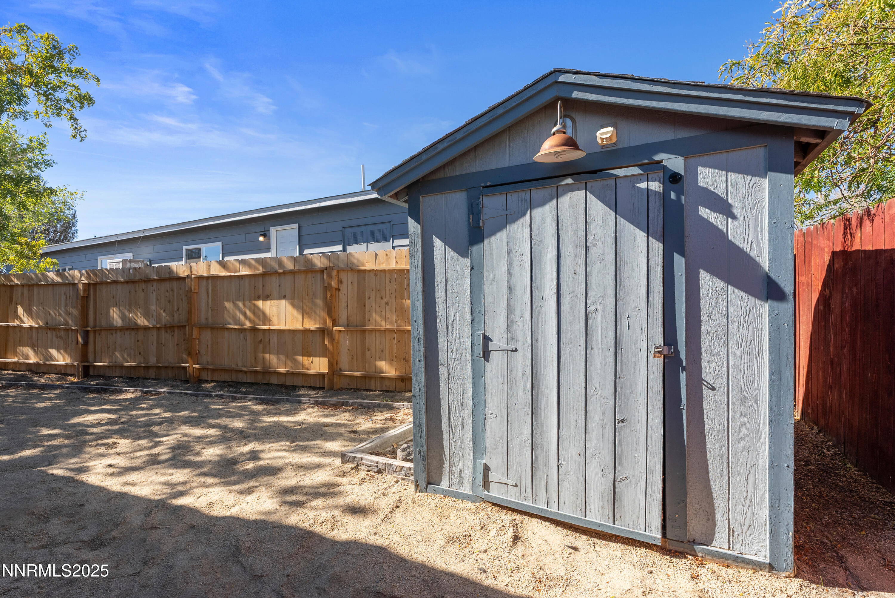 325 Parkland Way Fernley, NV 89408 - Photo 31 of 35 a front view of a house with a yard