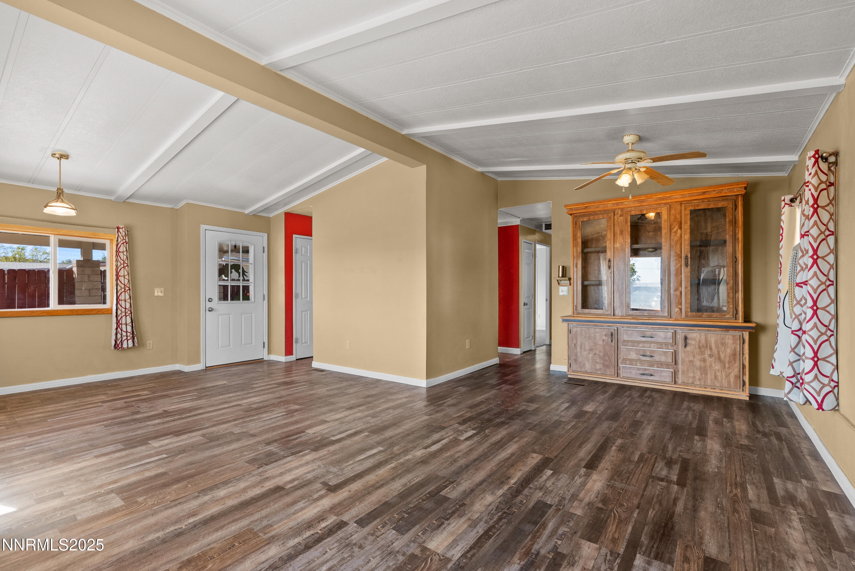 325 Parkland Way Fernley, NV 89408 - Photo 9 of 35 a view of empty room with wooden floor