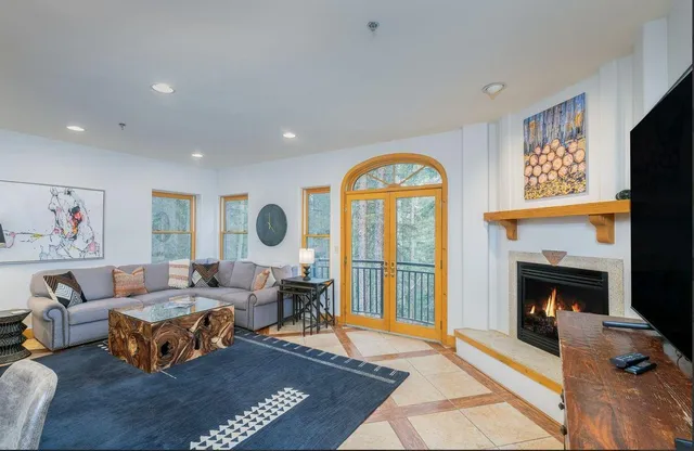 a view of a living room and dining room