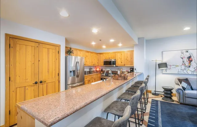 a bedroom with bed and a window