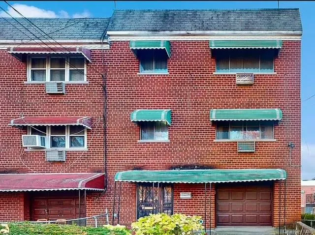 a front view of a house with glass windows
