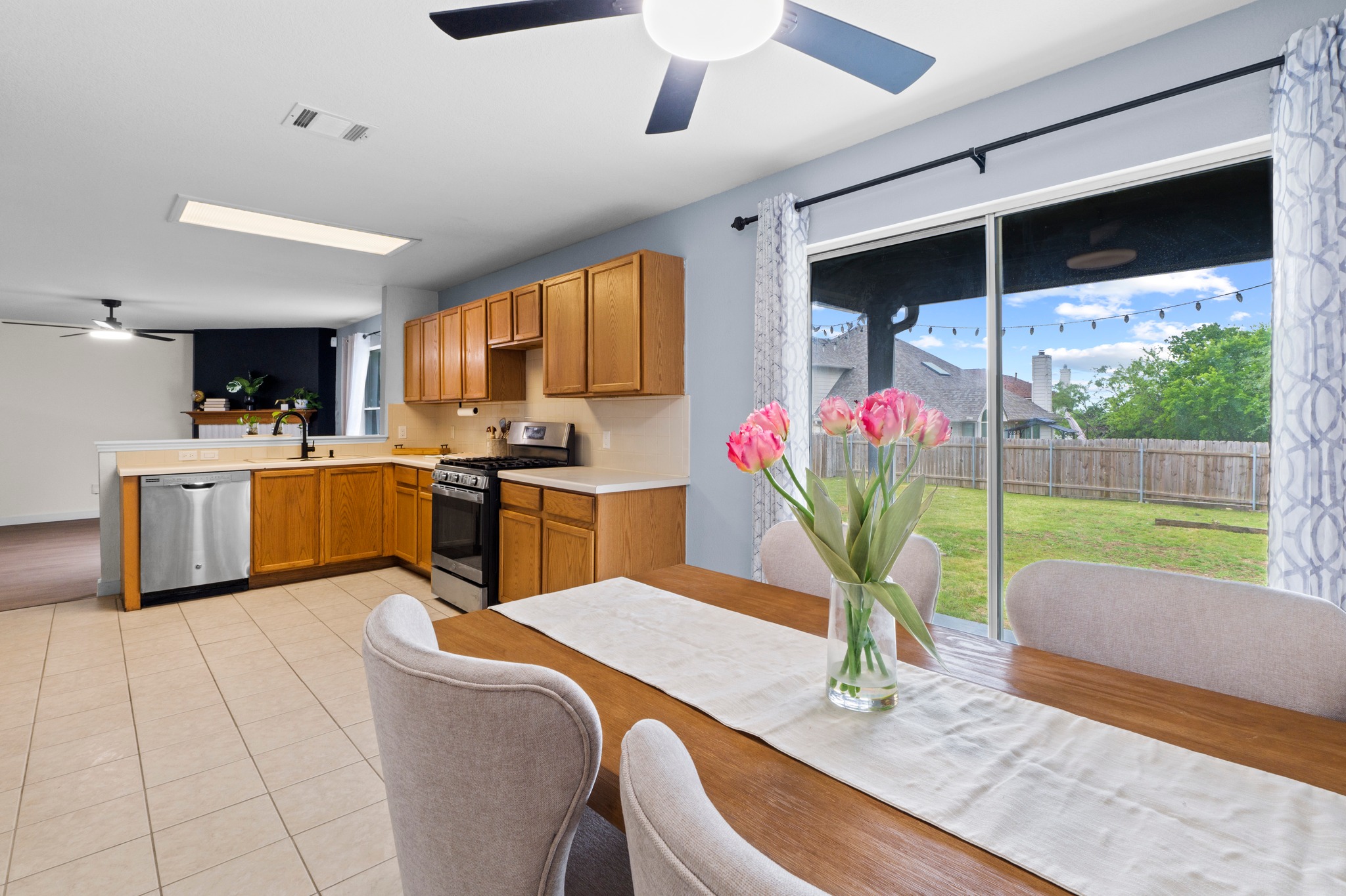 3811 Laurel Ridge Drive Round Rock, TX 78665 - Photo 19 of 35 a kitchen with stainless steel appliances kitchen island granite countertop a sink and a counter top space