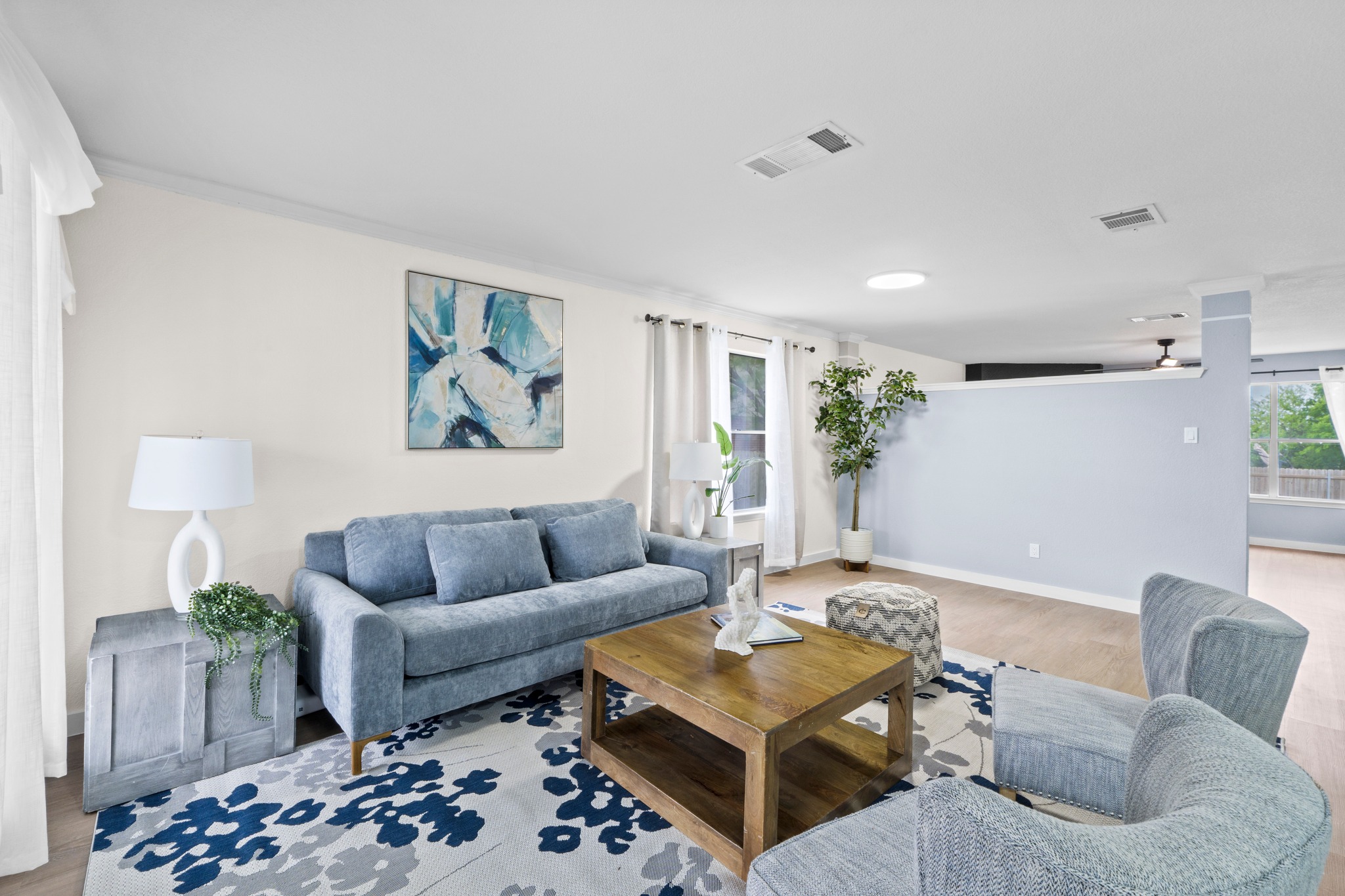 3811 Laurel Ridge Drive Round Rock, TX 78665 - Photo 9 of 35 a living room with furniture and wooden floor