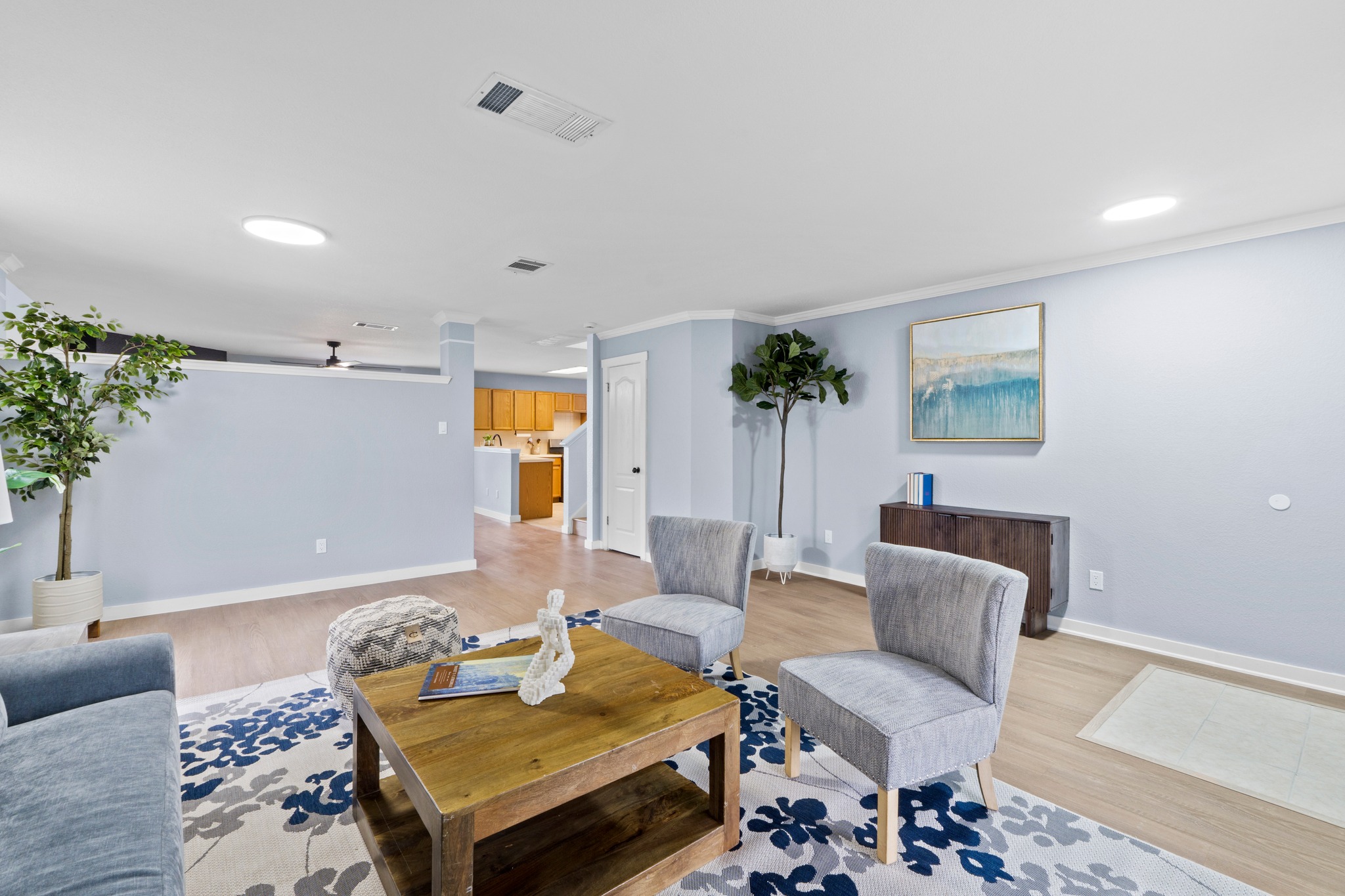 3811 Laurel Ridge Drive Round Rock, TX 78665 - Photo 10 of 35 a living room with furniture and wooden floor