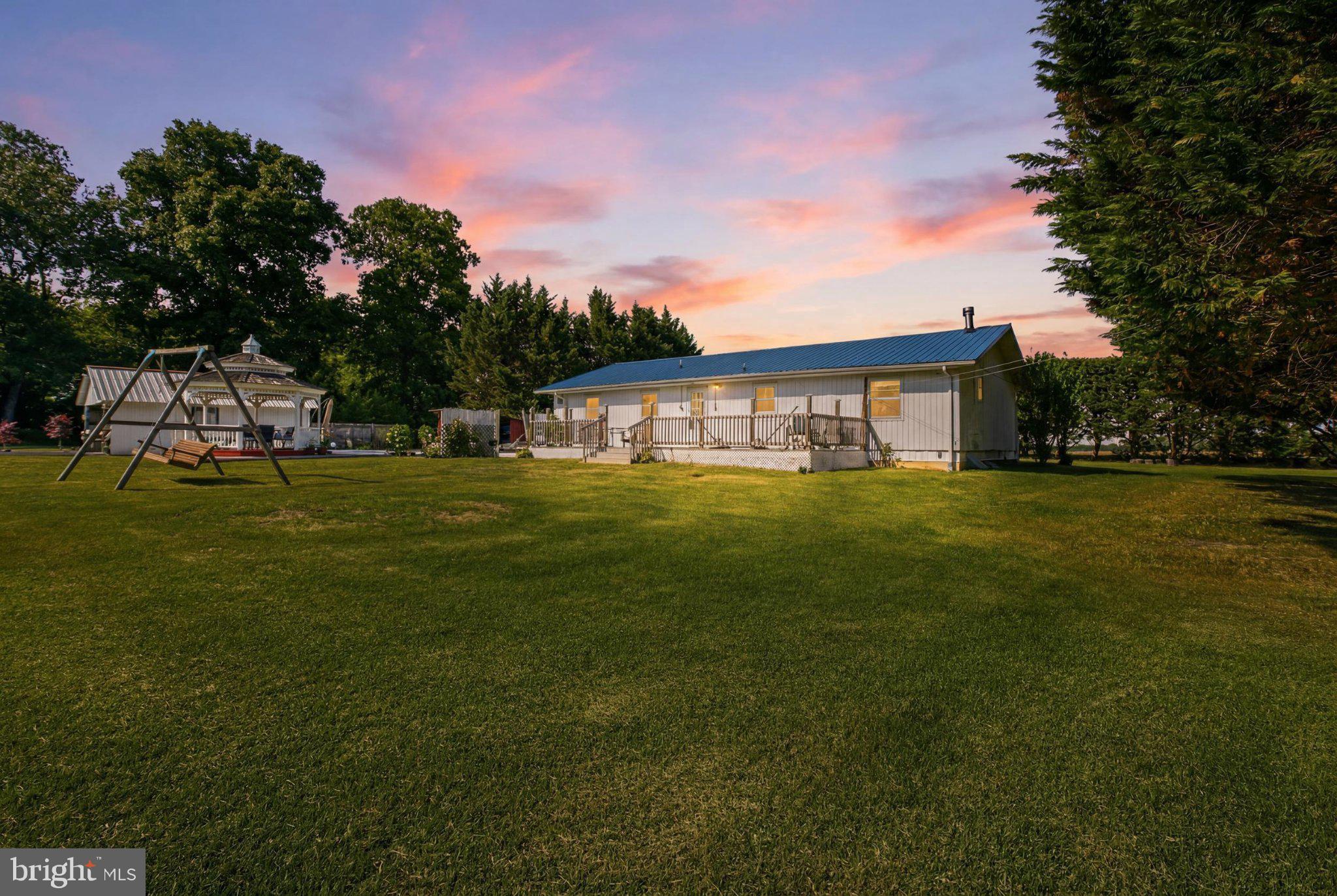 310 Dogtown Road Townsend, DE 19734 - Photo 26 of 43 Charming home under a sunset sky.