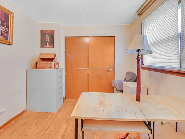 a workspace with furniture and window