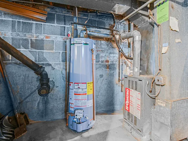 a utility room with multiple dryer